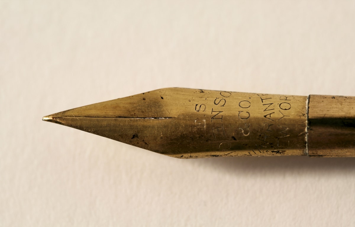 Fountain pen resting on a signed contract